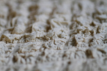 Beige fabric background. Fabric background that can be used in graphic works. Embossed fabric background.