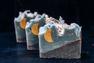 Beautiful handmade blue soap with a half-moon inlay and Himalayan salt

