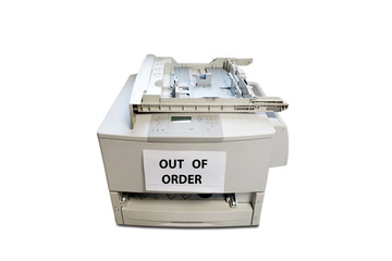Obsolete degraded office copier on white background