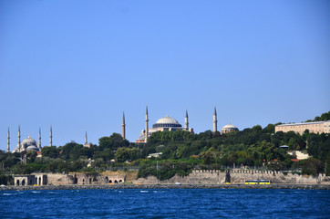 Fototapeta na wymiar Hagia Sophia, is one of symbols of Istanbul, shot from boat which was on the sea.