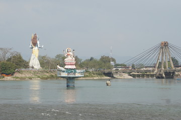 statues of some idols situated on the ganges river in haridwar