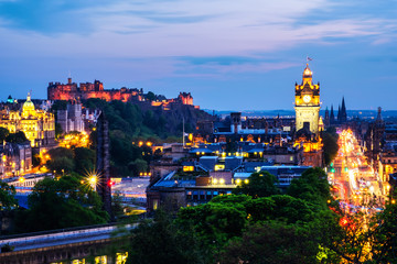 Aerial view from Calton Hill in Edinburgh, Scotland. The city with illuminated Castle and Clock Tower