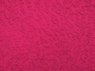 Shocking pink color cement and concrete texture for pattern abstract background.Grunge wall texture.