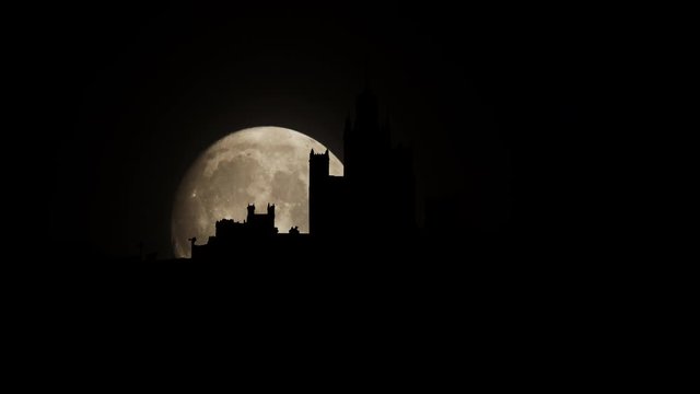 Full moon on the background of the Ukraine hotel in Moscow Time Lapse.