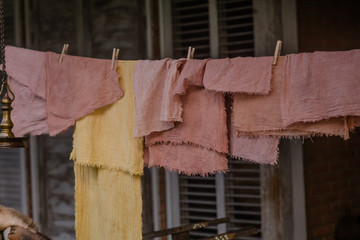 authentic house, villa in rural Balinese, with natural decor, in the form of drying fabrics on the terrace