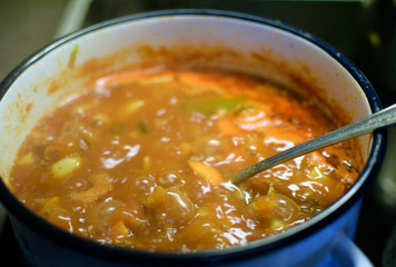 Soup boiling in cooking pot