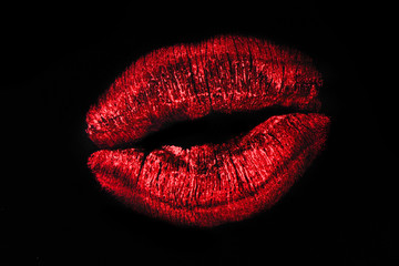 Red lipstick mark on black