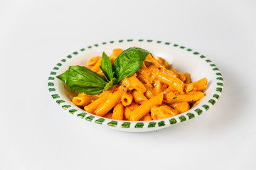 Italian cuisine penne pasta with creamy sauce
