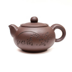 Clay Chinese teapot isolated on white