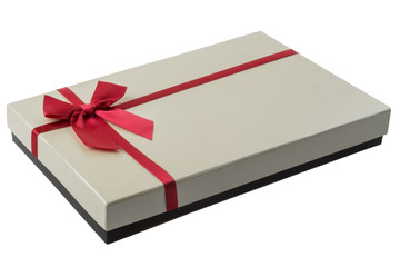 Flat beige box with a red bow isolated on white