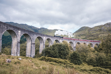 A train traveling over Harry Potter bridge in Scotland