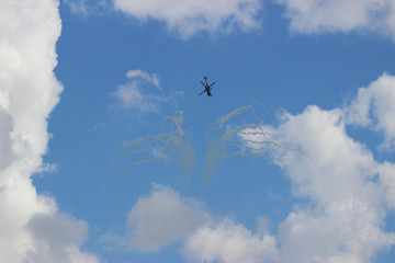 Obraz na płótnie Canvas Military helicopter during the flight