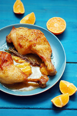 Cooked chiken with oranges