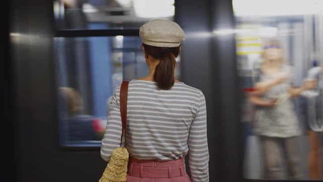 Young girl in a subway station in Paris, France