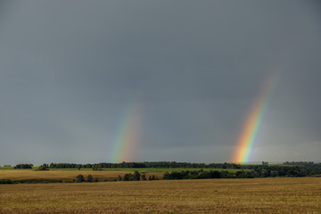 Double rainbow on the horizon