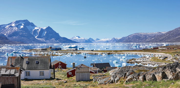 Abandoned fishing village, landscape Greenland, beautiful Nuuk fjord, ocean, iceberg with mountains background