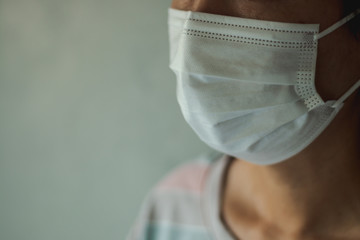 Asian woman wearing protective hygiene mask