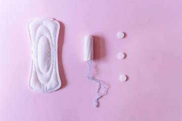 daily pad, swab and white pills