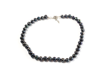 Fototapeta premium Natural Black Pearl Beads on Isolate White Background