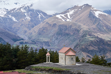Beautiful scenery of Kazbegi valley view from Ioane Natlismcemeli church, Caucasus mountain range in Georgia