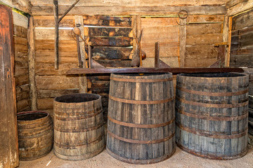 Old wooden barrels in cellar