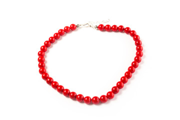 natural coral beads on a white background isolate