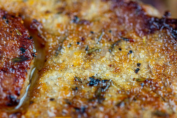 Macro on a juicy, delicious beef steak cooked in a frying pan