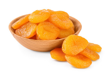 Fototapeta na wymiar Dried apricots in wooden bowl isolated on white background with clipping path and full depth of field.