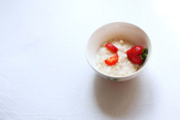 oatmeal porridge with strawberries for Breakfast