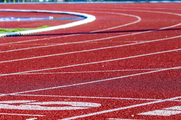 Red running sport track background and texture. Sport running track concept.