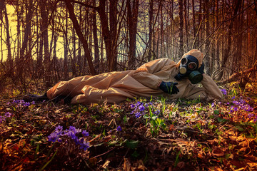 man in protective suit, mask in forest