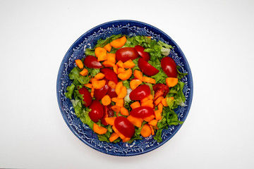 Top view salad on white background