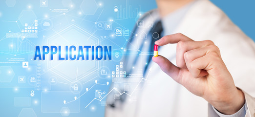 Doctor giving a pill with APPLICATION inscription, new technology solution concept