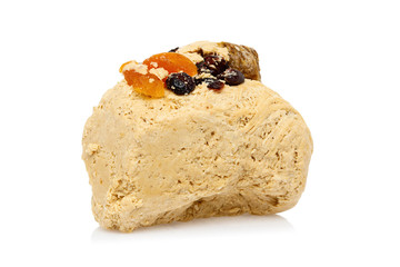 Halva with dried fruits isolated on a white background.