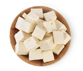 tofu cheese in wooden bowl isolated on white background with clipping path and full depth of field, Top view. Flat lay