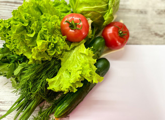 Bright seasonal vegetables on an abstract light surface.
