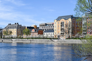 Norrkoping waterfront Saltangen and Motala stream on a sunny spring day in Aril 2020. Norrkoping is a historic industrial town in Sweden.