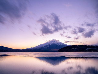 Fototapeta na wymiar Snow Covered Mt. Fuji Reflected in Lake Yamanaka at Sunset