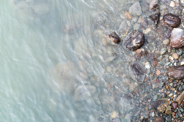 stone seashore river, stormy sea surf, rapid mountain stream