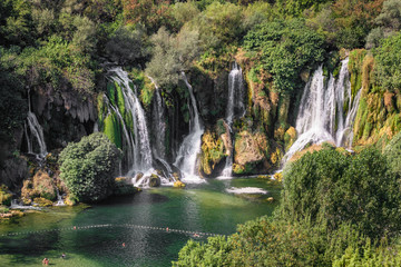 Fototapeta na wymiar Kravica waterfall on Trebizat river, Bosnia and Herzegovina