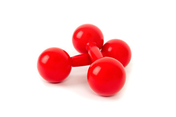 bright red sports dumbbells isolated on a white background
