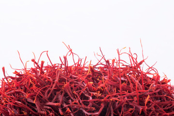 Naklejka premium Dried saffron spice isolated on white background.