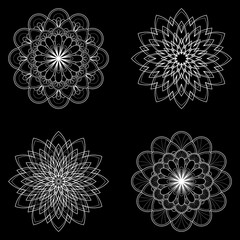  Set of four ethnic round Mandala ornaments isolated on black background. Henna tattoo design. Vector illustration