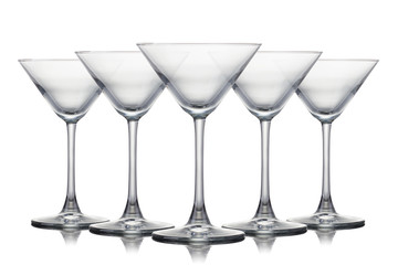 Set of empty martini glasses isolated on white background