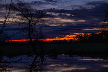 Fototapeta premium sunset over the lake