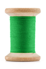 Colorful Spool sewing threads on white background