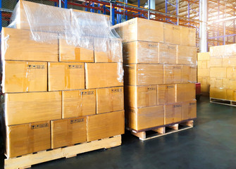 Interior of storage warehouse, stack of package boxes on pallets, cargo export, warehouse industry delivery shipment goods, logistics, transport