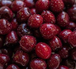 Cherry berries in droplets of water. Fresh berries. Close-up