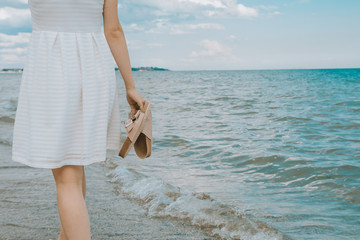 girl with beach slippers 