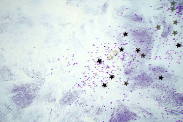 little stars on a delicate white and purple texture. abstract watercolor background with copy space